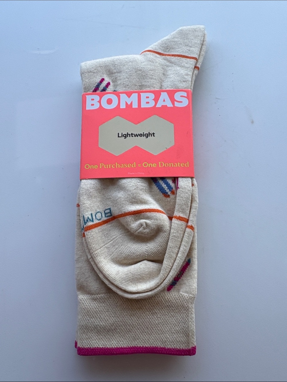 Bombas Lightweight Calf/Crew Socks. Beige with skiing pattern. Size L